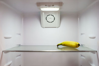 Close-up of fresh banana in refrigerator