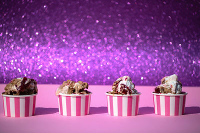 Panoramic shot of cupcakes against white background
