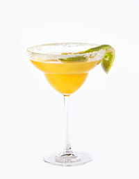 Close-up of drink against white background