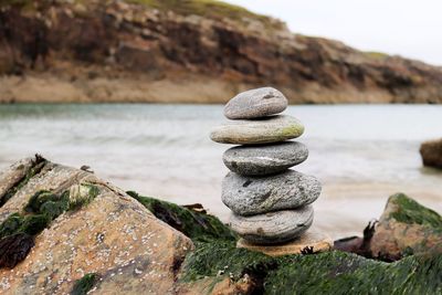 Stack of stones on sea shore