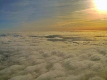 Sun shining through clouds