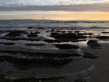 Scenic view of sea at sunset