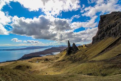 Panoramic view of sea and mountains against sky