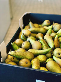 High angle view of pears in crate