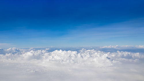 Aerial view of cloudscape against blue sky