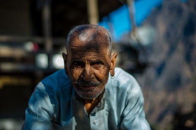 Portrait of man wearing mask outdoors