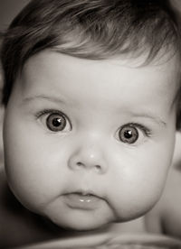 Portrait of cute baby girl with sparkling eyes