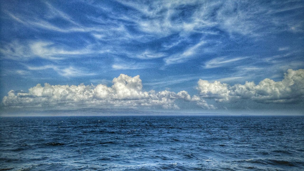 sea, waterfront, water, horizon over water, scenics, sky, beauty in nature, tranquil scene, tranquility, nature, rippled, cloud - sky, seascape, blue, idyllic, cloudy, cloud, outdoors, wave, day