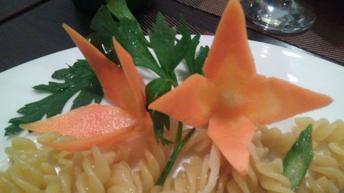 Close-up of chopped fruits in plate