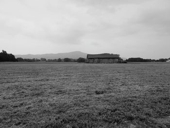 House on field against sky