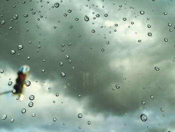 Close-up of water drops on glass