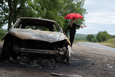 Car on road against trees