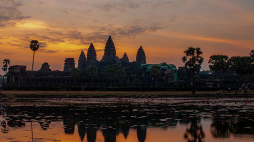 Panoramic view of temple building against sky during sunset