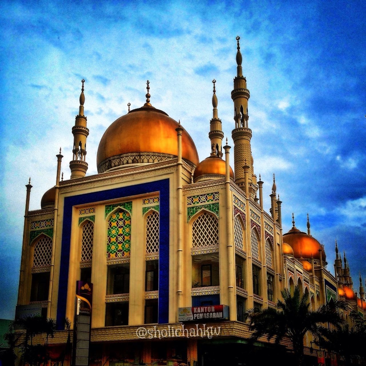 architecture, built structure, building exterior, low angle view, sky, dome, place of worship, cloud - sky, religion, blue, spirituality, arch, cloud, facade, street light, outdoors, illuminated, lighting equipment, no people, church