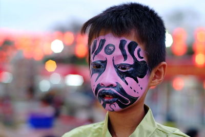 Close-up of boy wearing carnival costume