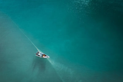 High angle view of boat sailing on sea