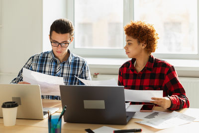 Business colleagues working at office