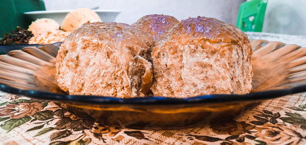 Close-up of bread in plate on table