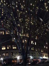 Low angle view of illuminated building at night