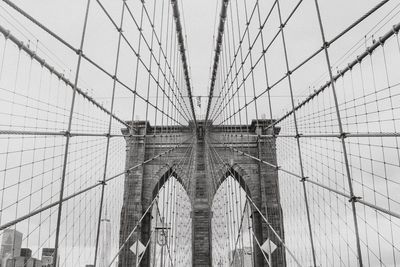 Brooklyn bridge against clear sky in city