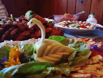 Close-up of food served on table