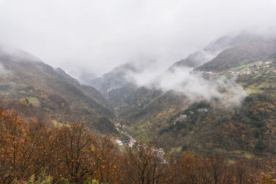 Scenic view of mountains against sky during autumn