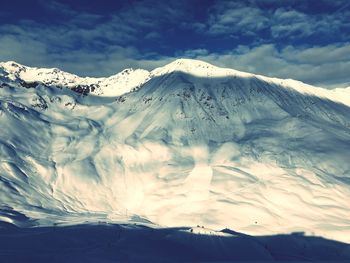 Scenic view of snowcapped mountains