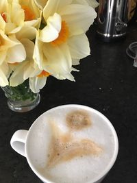 Close-up of coffee cup on table