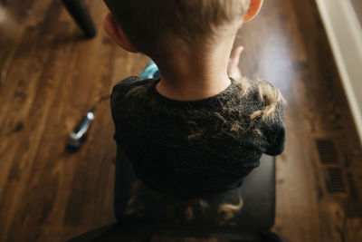 Rear view of boy with hair on shoulder