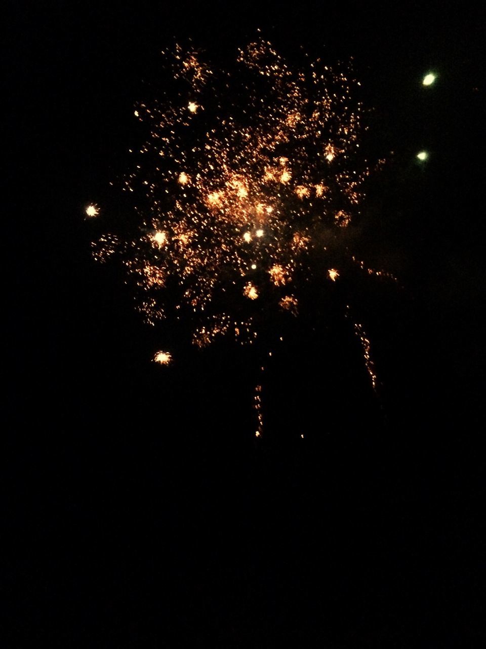 night, illuminated, firework display, celebration, exploding, long exposure, firework - man made object, glowing, low angle view, motion, firework, sparks, arts culture and entertainment, event, sky, light - natural phenomenon, dark, outdoors, light, blurred motion