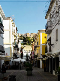 Buildings in city against sky