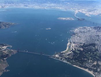 High angle view of cityscape by sea