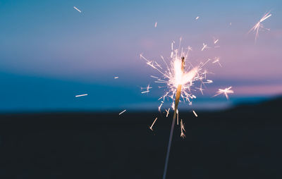 Firework display at night