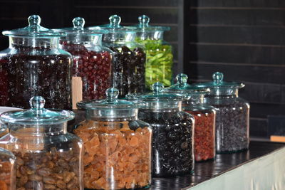 Close-up of glass jar on table
