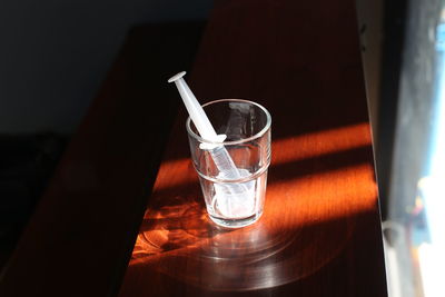 Close-up of water in glass on table