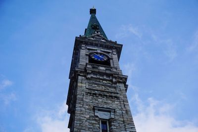 Low angle view of clock tower against sky