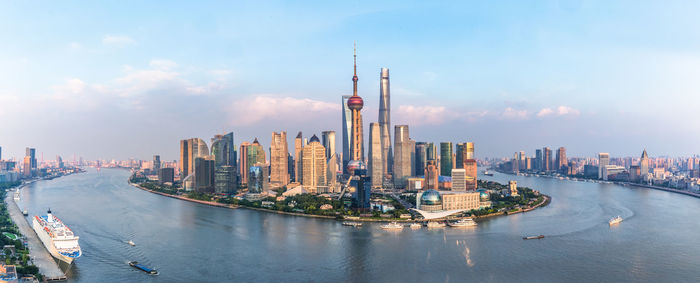 Panoramic view of city buildings against sky