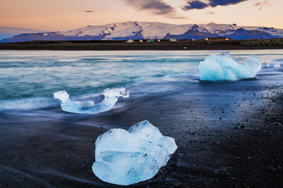 Scenic view of frozen sea against sky