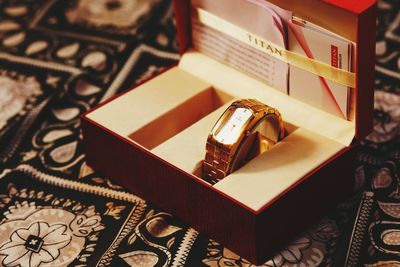 High angle view of wedding rings on table