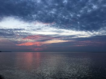 Scenic view of sea against sky at sunset