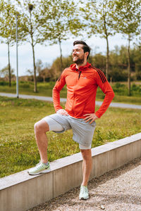 Full length of young man standing outdoors