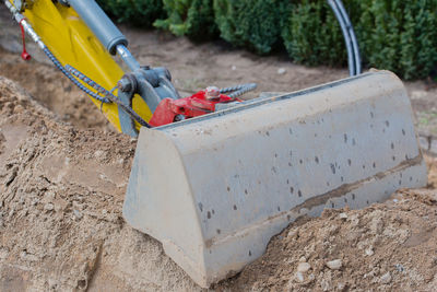 Close-up of construction on sand