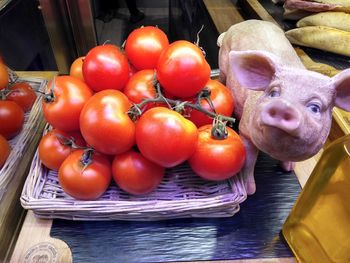 High angle view of tomatoes in basket on table