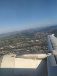 Aerial view of cityscape against sky