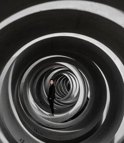 Man standing in tunnel