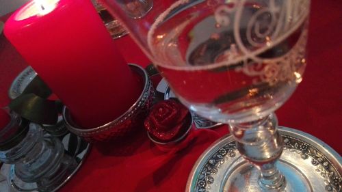 High angle view of red wine on table