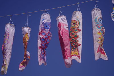 Colorful traditional koi carp streamers hanging for children's day in japan