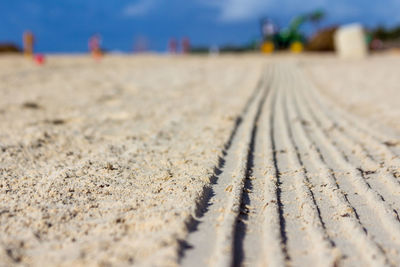 Surface level of tire tracks on beach