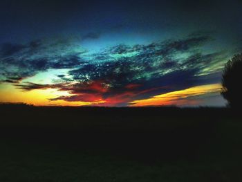 Scenic view of dramatic sky during sunset