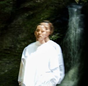 Defocused image of man standing outdoors